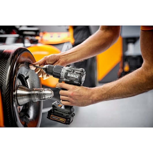 Limited Editon DEWALT/McLaren Drill Driver being used on McLaren carbon fibre wheel  