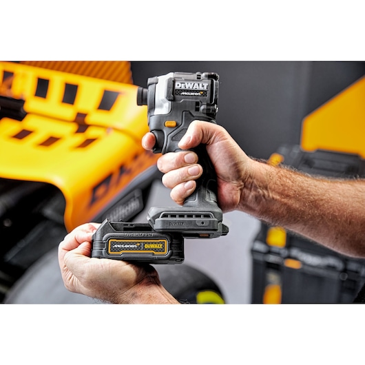 Battery being connected to Limited Editon DEWALT/McLaren Impact Driver