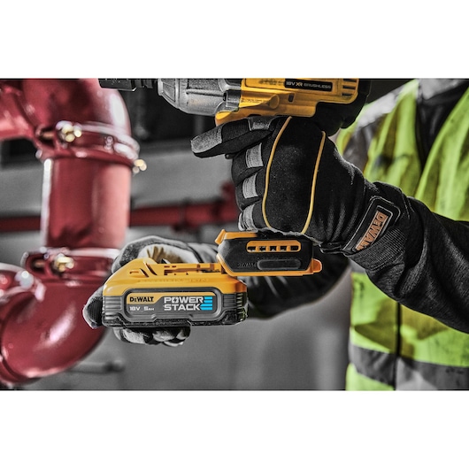 18V XR Brushless Impact Wrench with battery being added to tool