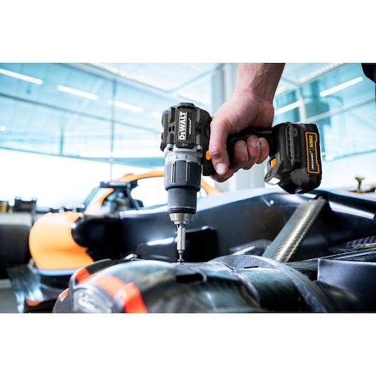 Limited Editon DEWALT/McLaren Drill Driver being used by mechanic on a McLaren car chassis