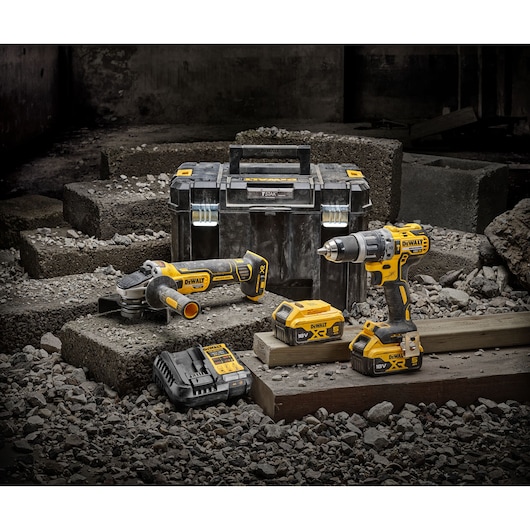 Kit including DCD796 Combi Drill, DCG405 Angle Grinder, 2 x DCB184 5.0Ah batteries, DCB1104 Charger and TSTAK Case