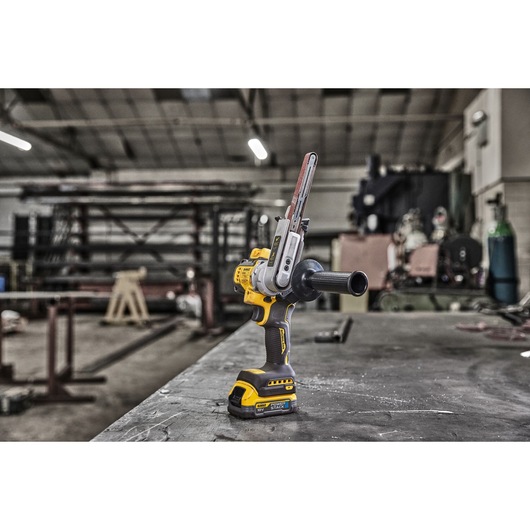 18V XR Band File, with Powerstack battery,  placed on top of  a metal fabricator's work top