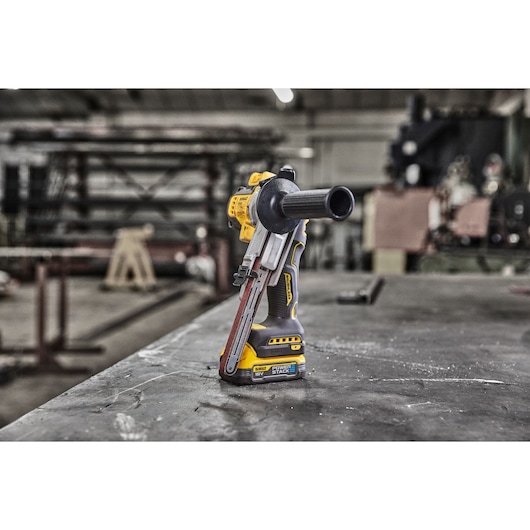 18V XR Band File, with Powerstack battery,  placed on top of  a metal fabricator's work top