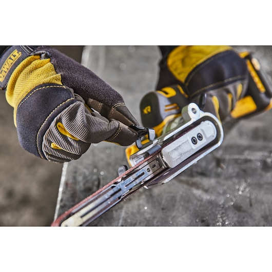 Close view of belt release switch on 18V XR Band File