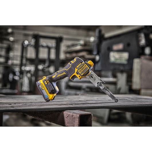 18V XR Band File placed on top of  a metal fabricator's work top