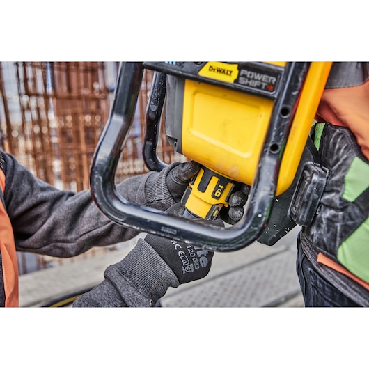 Hose being fitted to Powershift Backpack Concrete Vibrator 