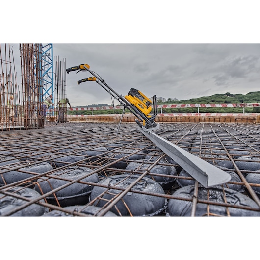 Powershift Screed with L shaped beam on a bed of rebar