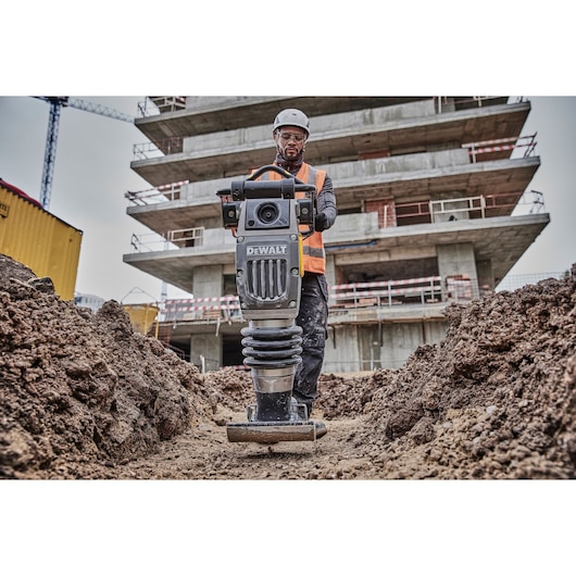 Powershift Rammer compacting ground on construction site