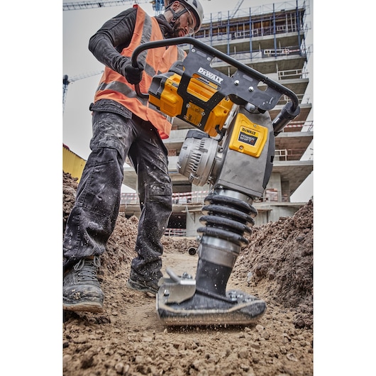 Powershift Rammer compacting ground on construction site