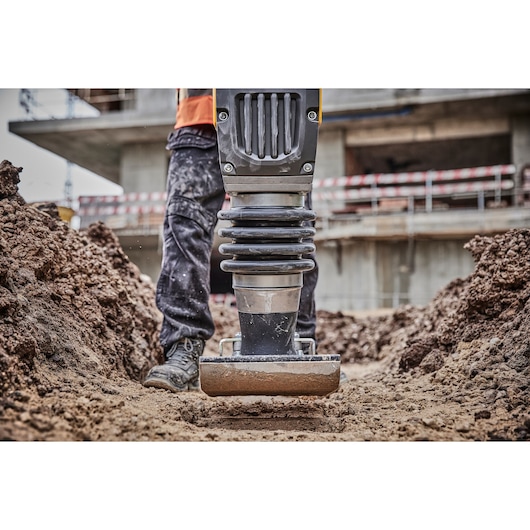 Powershift Rammer compacting ground on construction site