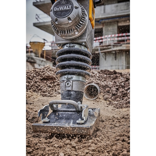 Close view of Powershift Rammer compacting ground on construction site