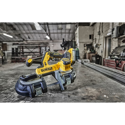 18V XR Band Saw  on top of  a metal fabricator's work top 