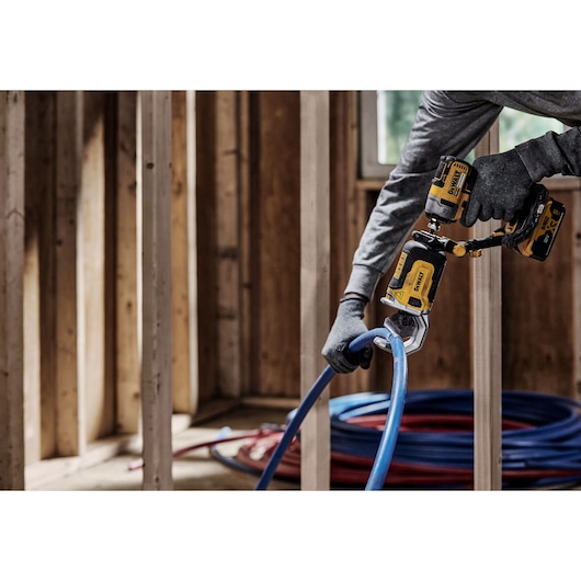 Impact Connect PVC/PEX pipe cutter attachment on Impact Driver cutting PEX pipe