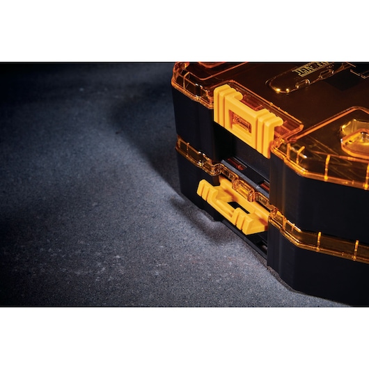 Close up featuring handles of DEWALT 34 piece drive socket set.